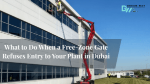 Low bed with boom lift refused entry at Dubai free zone gate despite valid driver pass, barrier remaining down